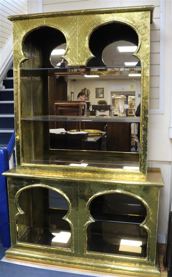 A Rodolfo Dubarry brass overlaid open display unit, W.4ft 7in. H.7ft